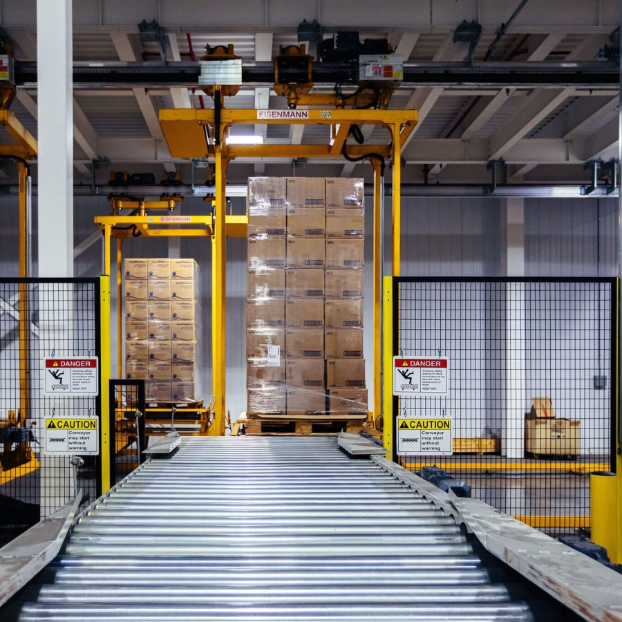 Automated cold storage pallet handling system using advanced computer vision technology for efficient material processing.